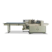 Pillow wrapping machine
